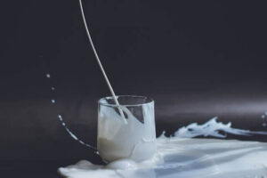 splashing milk leaking out of cup