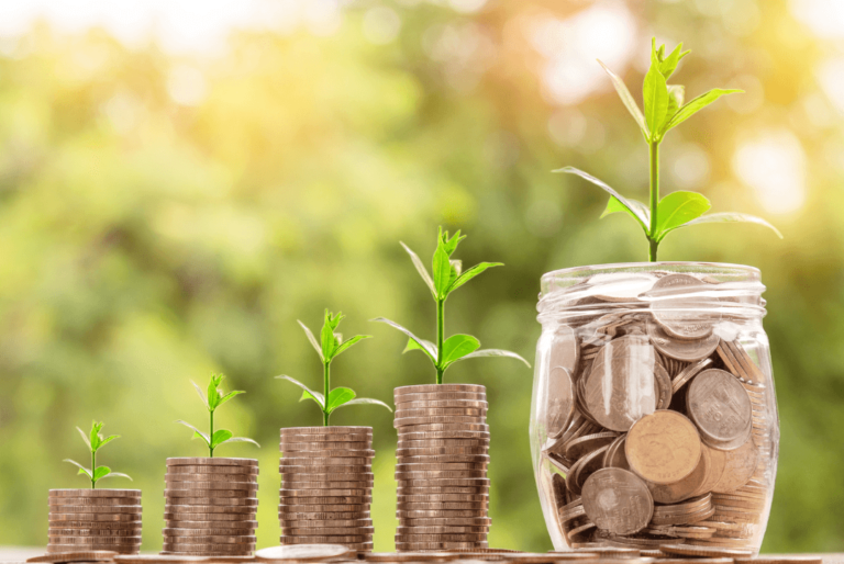 jar of coins sprouting a plant