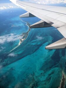 clear blue water from plane window