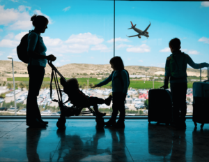 mom with 3 kids at airport