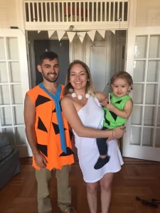 family dressed as the flintstones for halloween