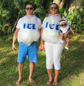 parents dressed as ice and baby as baby for halloween