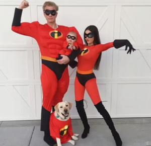 family dressed as mr. and mrs. incredible and jack jack for halloween