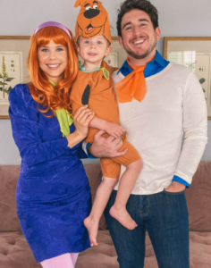 family dressed as fred, daphne, and scooby for halloween